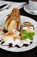 Pear with whipped cream and nuts