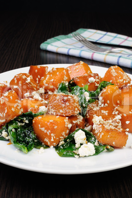 pumpkin with spinach and sesame seeds