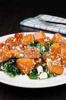 pumpkin with spinach and sesame seeds