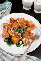 pumpkin with spinach and sesame seeds