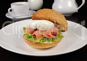 Burger with salmon and poached egg