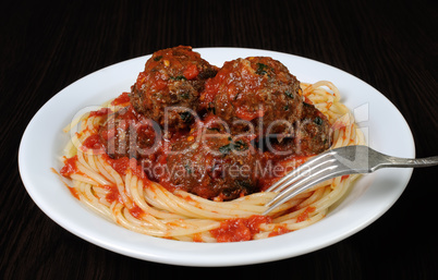 Meatballs in tomato sauce with spaghetti