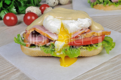 Sandwich with ham and poached egg.