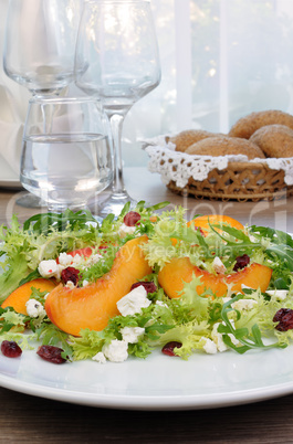 Light salad with peaches