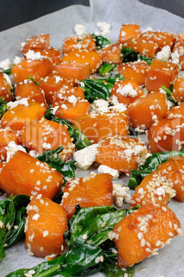 pumpkin with spinach and sesame seeds