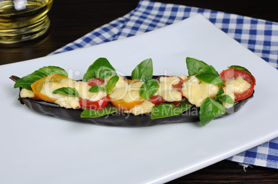 Baked eggplant with tomatoes and cheese