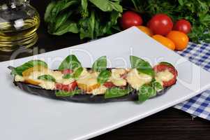 Baked eggplant with tomatoes and cheese
