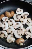 Sliced mushrooms fried in oil