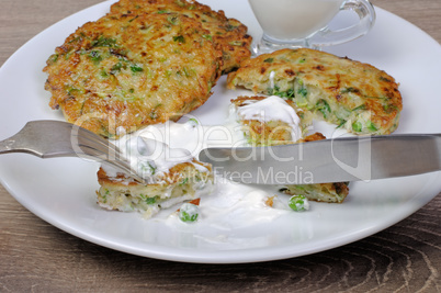 Fritters of zucchini and peas