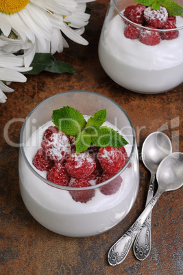 Dessert with whipped cream and raspberries