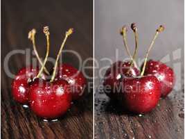 Cherries on wooden table with water drops