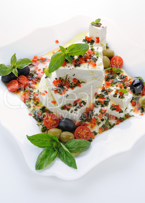 Feta cheese in oil with basil