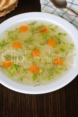 Chicken vermicelli soup with green peas