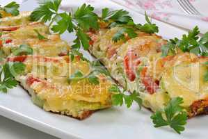 Baked zucchini with tomatoes and cheese