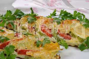 Baked zucchini with tomatoes and cheese