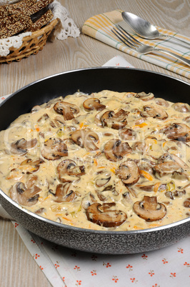 Fried mushrooms in a creamy sauce