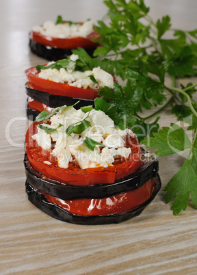 Roasted eggplant with tomatoes and ricotta