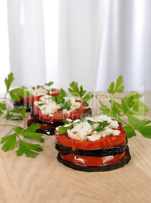 Roasted eggplant with tomatoes and ricotta