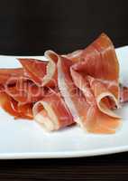 Uncooked jerked pork ham slices of jamon