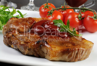 Pork steak with ketchup