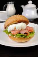 Burger with salmon and poached egg