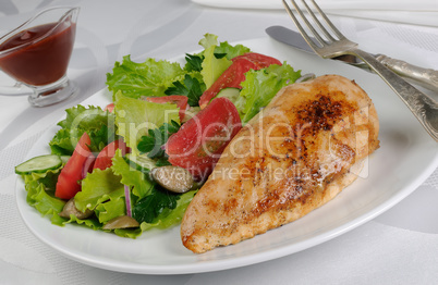 Chicken schnitzel with vegetable garnish