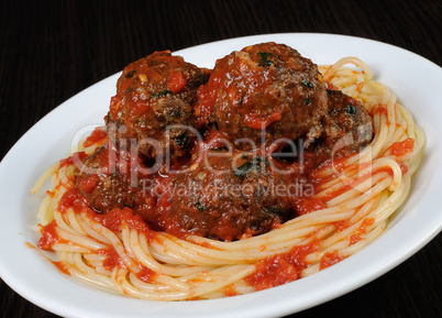 Meatballs in tomato sauce with spaghetti