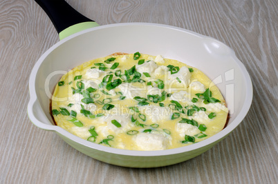 Omelet with feta cheese and green onions