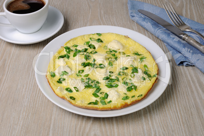 Omelet with feta cheese and green onions