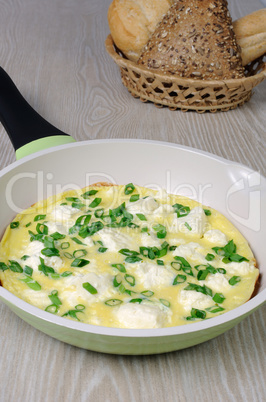 Omelet with feta cheese and green onions