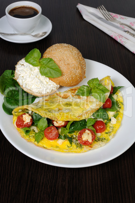 Omelet with spinach, basil, cherry tomatoes and cheese Adyg