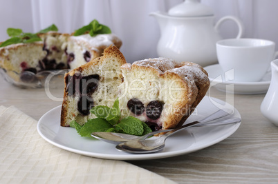 Pieces of sponge cake with cherries