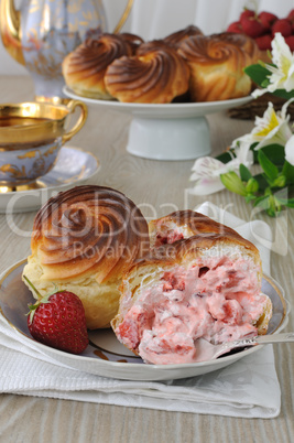 Eclairs with strawberry cream filling