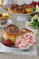 Eclairs with strawberry cream filling