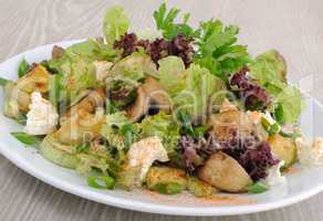Salad with mushrooms with zucchini, cheese in lettuce leaves and