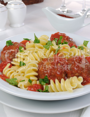 Pasta with meatballs in tomato sauce