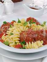 Pasta with meatballs in tomato sauce