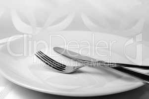 Knife and fork on a plate