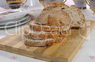 oat bread slices on wooden board