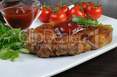 Pork steak with ketchup