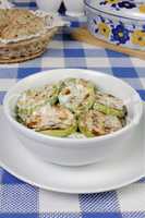 Zucchini in milk sauce