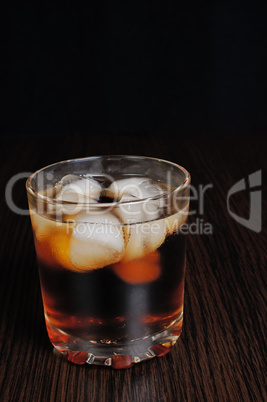 Glass of cola with ice