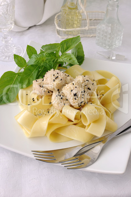 Italian pasta - Pappardelle with chicken fillet in a creamy sauc