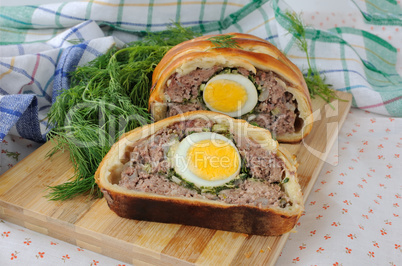Meatloaf with egg and greens in the test
