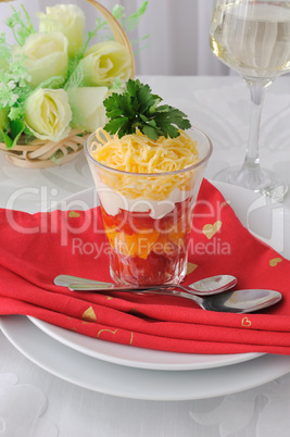 Salad of red and yellow tomatoes with mayonnaise and cheese