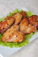 Baked chicken wings with garlic