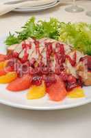Sliced ??baked fillet with cranberry sauce