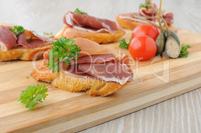 slices of bread with spanish serrano hamon
