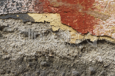 Close up of crumbling  wall with layers of peeled paint 9