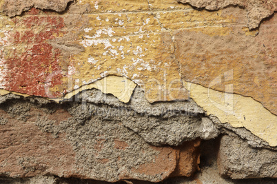 Close up of crumbling  wall with layers of peeled paint 2